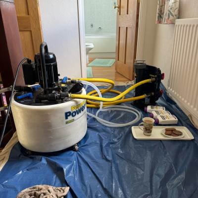Heating maintenance equipment set up on protective floor covering